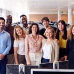 portrait-of-smiling-business-team-working-in-moder-2024-10-20-06-25-32-utc (1)